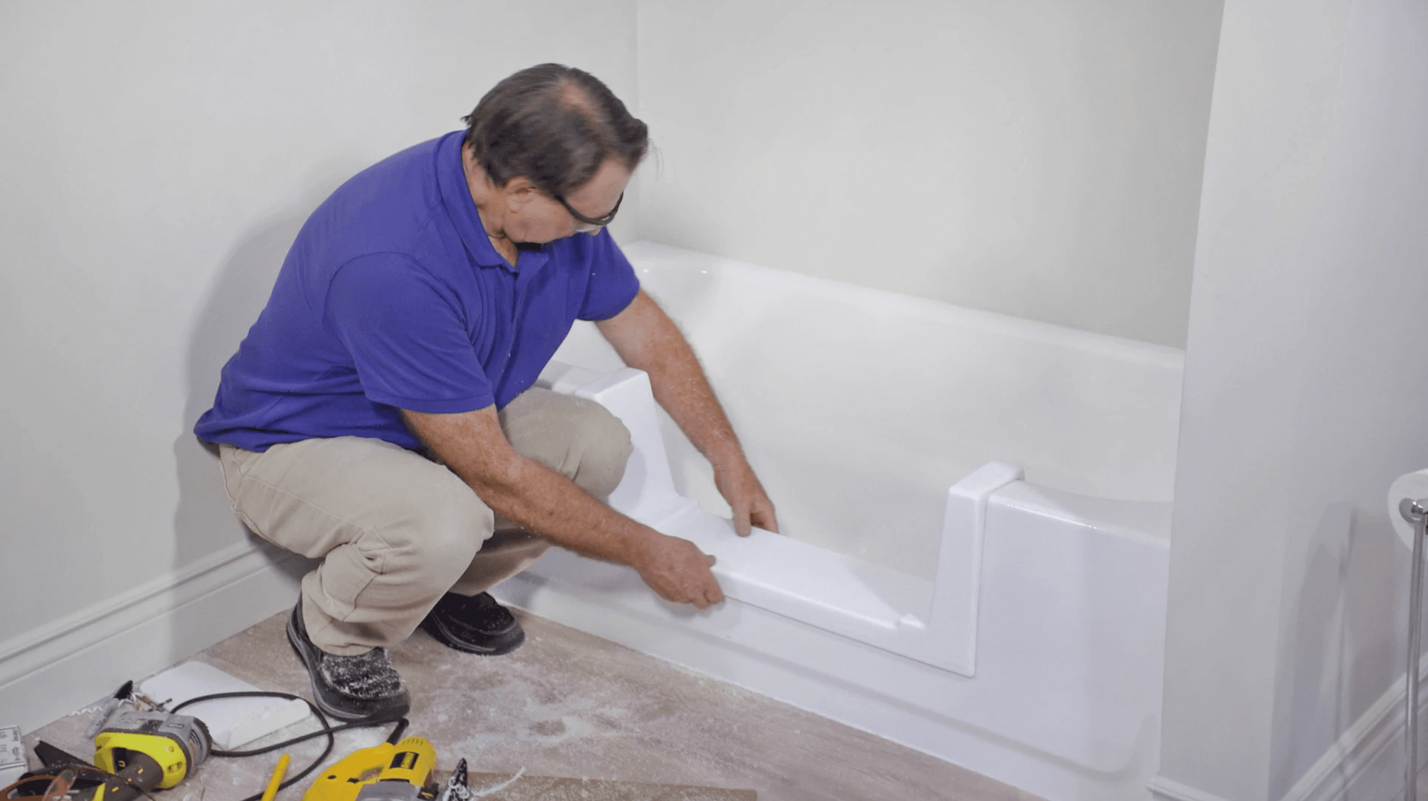 Man Installing Walk In Tub